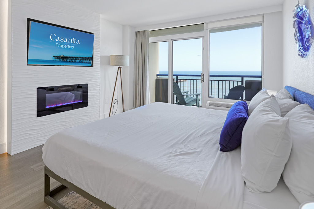 Oceanfront bedroom with balcony and ocean view
